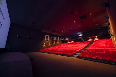 Miniature Location salle Caen (Calvados) - Pathé Les Rives de l'Orne #6 Intérieur d'un bâtiment moderne avec escalier, rambardes en métal, murs colorés et grandes baies vitrées.