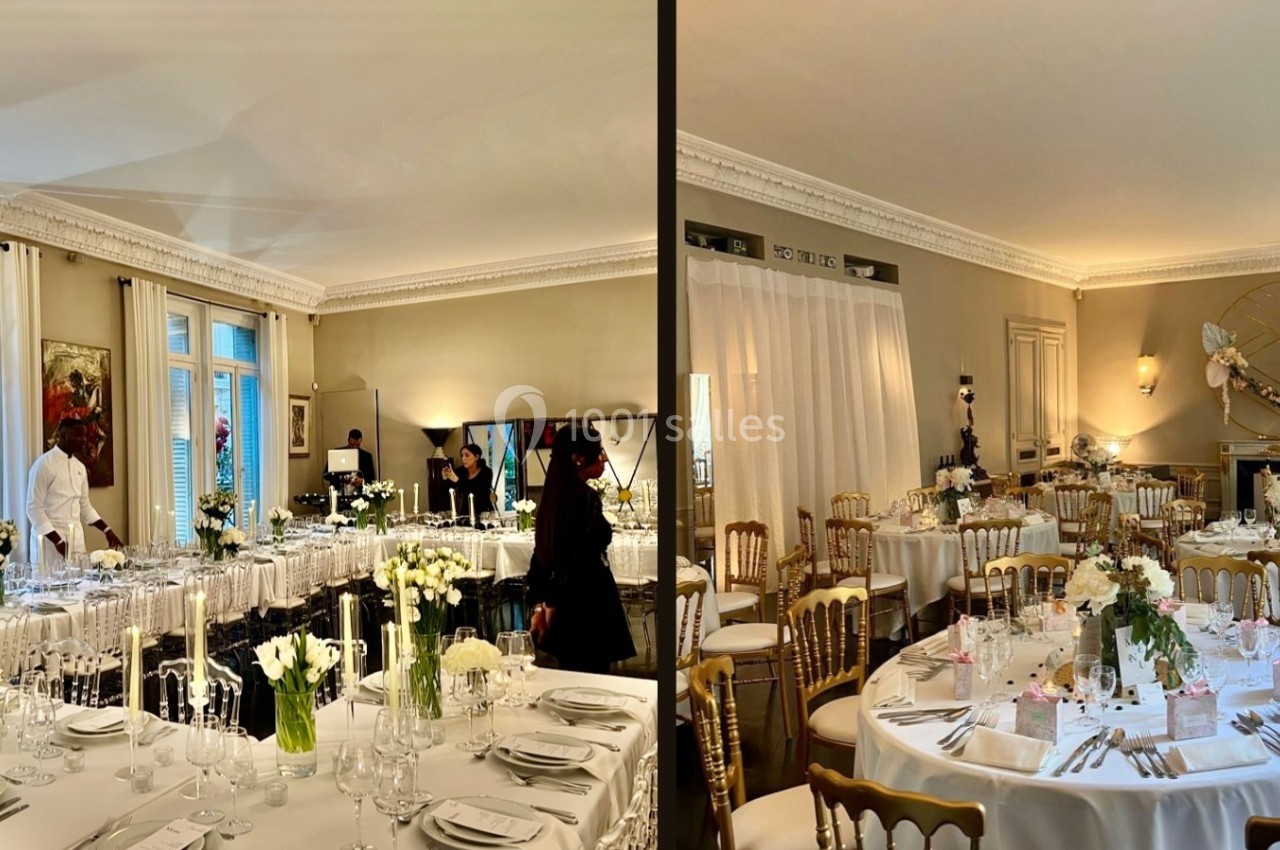 Salle élégante décorée pour un événement, avec tables rondes dressées, fleurs blanches et chaises dorées.