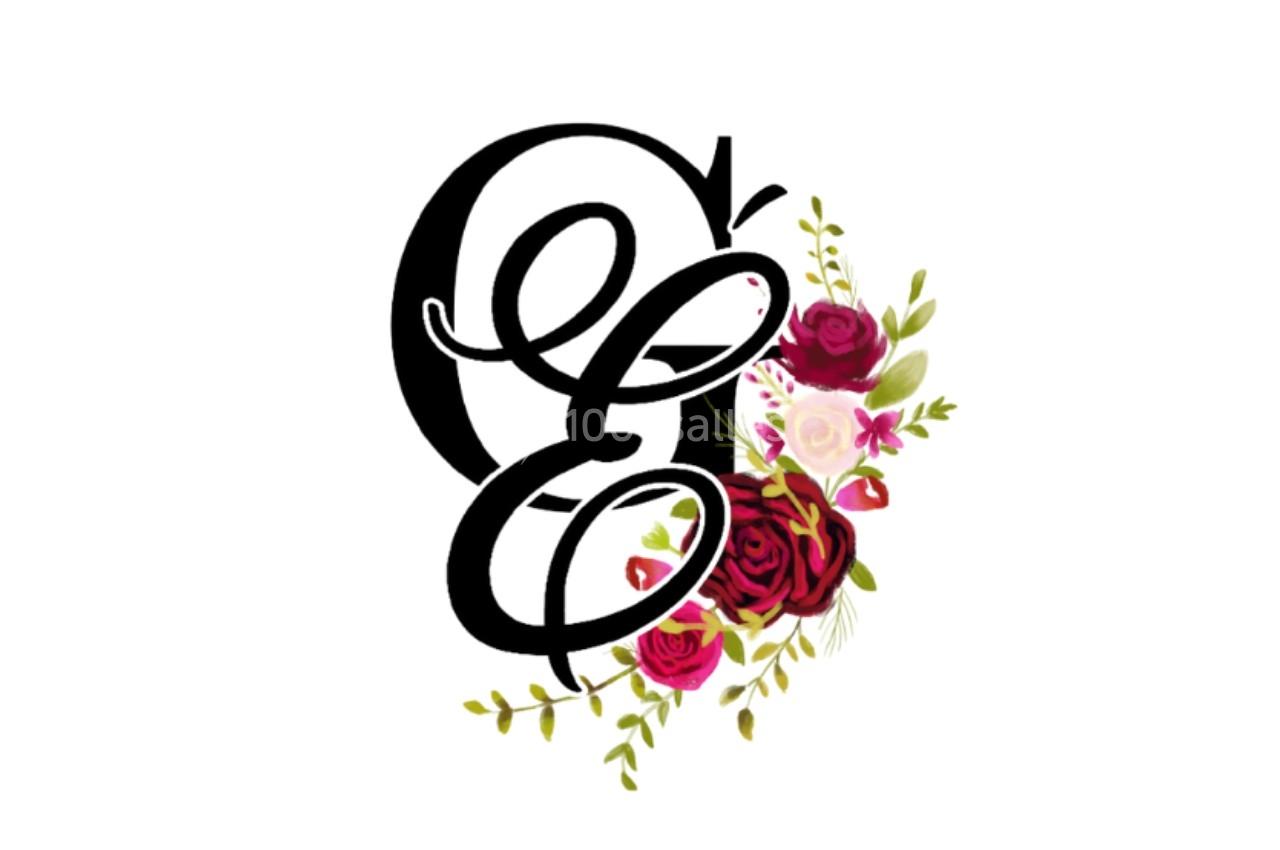 Lettrage décoratif noir entouré de fleurs rouges, roses et feuillages verts sur fond blanc.