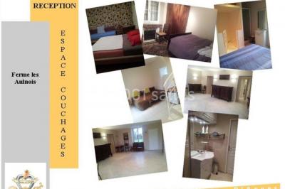 Miniature Location salle Saints (Seine-et-Marne) - Domaine Les Aulnois #35 Deux réfrigérateurs professionnels vides dans une pièce carrelée avec une table en inox au premier plan.