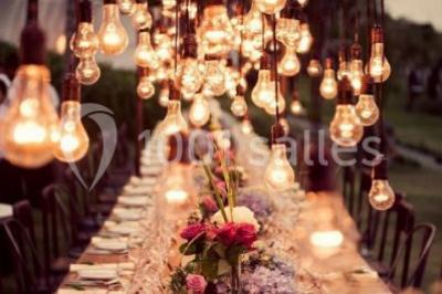 Miniature Location salle Champdieu (Loire) - Domaine de Villeroy #2 Escalier extérieur en pierre éclairé par des lumières LED, devant une maison au crépuscule avec des arbres environnants.