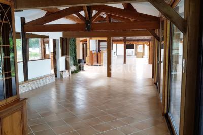 Logo du Domaine Les 3 Rivages avec des ornements décoratifs et la mention ’Réceptions & Séminaires’.