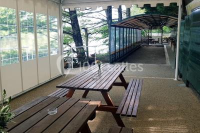 Logo du Domaine Les 3 Rivages avec des ornements décoratifs et la mention ’Réceptions & Séminaires’.