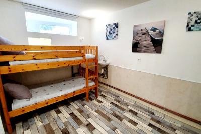 Logo du Domaine Les 3 Rivages avec des ornements décoratifs et la mention ’Réceptions & Séminaires’.