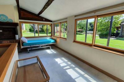 Logo du Domaine Les 3 Rivages avec des ornements décoratifs et la mention ’Réceptions & Séminaires’.