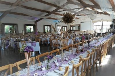 Texte ’Jean Loup’ écrit en calligraphie brune sur fond beige, accompagné de deux empreintes de mains.