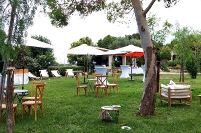 Texte ’Jean Loup’ écrit en calligraphie brune sur fond beige, accompagné de deux empreintes de mains.
