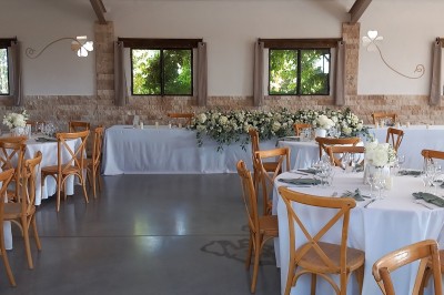 Texte ’Jean Loup’ écrit en calligraphie brune sur fond beige, accompagné de deux empreintes de mains.