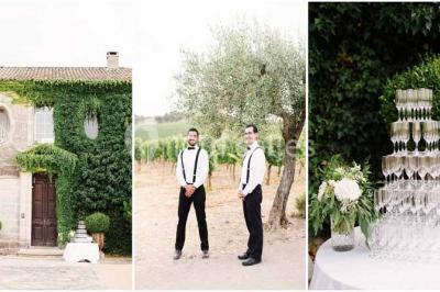 Vue d'une pièce lumineuse avec sol en carreaux anciens, mobilier classique et une chambre attenante avec lit à baldaquin.