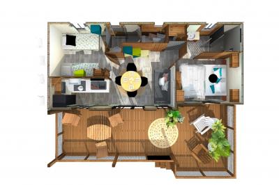 Plan en vue aérienne d'un appartement avec deux chambres, une salle de bain, une cuisine, un salon et une terrasse aménagée.