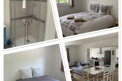 Bancs en bois disposés en extérieur, ornés de sacs en papier, avec une table blanche en arrière-plan près d'un étang.