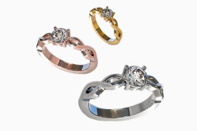 Anneaux en métal de différentes formes, textures et couleurs suspendus en arc sur fond blanc.