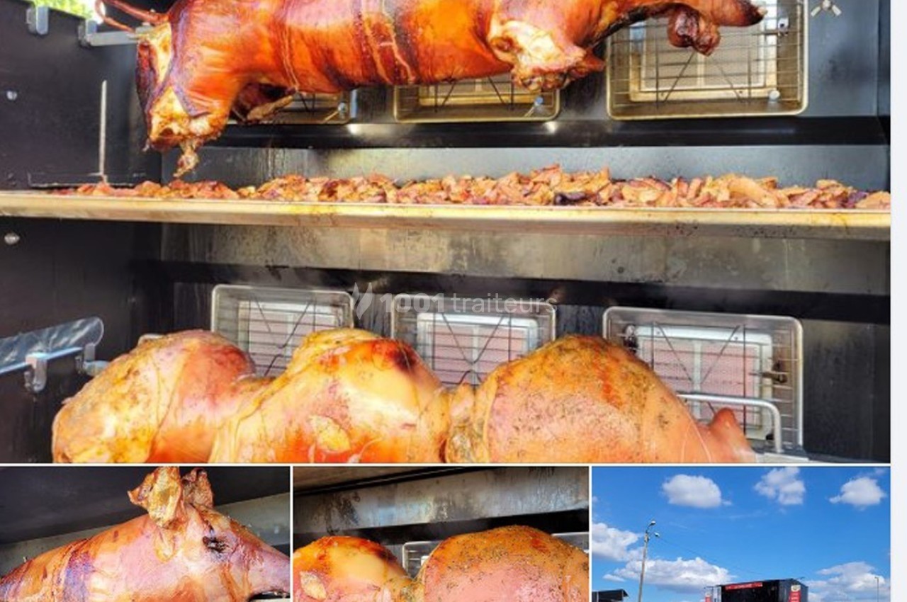 Cochon rôti entier et jambons cuits à la broche dans un four en extérieur lors d'un événement en plein air.