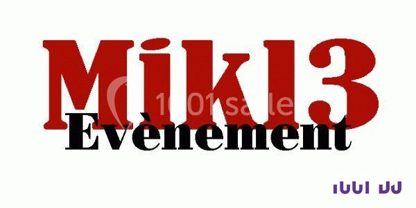 Texte ’Mikl3 Évènement’ en rouge et noir sur fond blanc, avec un petit logo violet en bas à droite.
