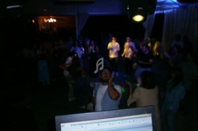 Miniature DJ Varilhes (Ariège) - Disco Mobile Pascal Animation #6 Groupe de personnes dansant sous un chapiteau éclairé par des lumières colorées lors d'une soirée festive.