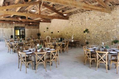 Miniature Location salle Saint-André-de-Sangonis (Hérault) - Château de Granoupiac #11 Façade d'une grande maison blanche entourée d'arbres, avec une pelouse verdoyante au premier plan.