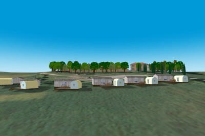 Miniature Location salle Monferran-Savès (Gers) - Le Meillon #23 Vue aérienne d'un terrain avec des bâtiments, des véhicules stationnés et des structures alignées en bordure d'un champ.