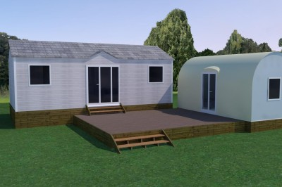 Miniature Location salle Monferran-Savès (Gers) - Le Meillon #24 Vue aérienne d'un terrain avec des bâtiments, des véhicules stationnés et des structures alignées en bordure d'un champ.