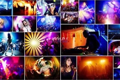 Des artistes en costumes brillants dansent sur une scène illuminée par des projecteurs colorés et un écran lumineux.