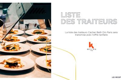 Des assiettes garnies de poisson et légumes sont préparées en cuisine avant d’être servies.