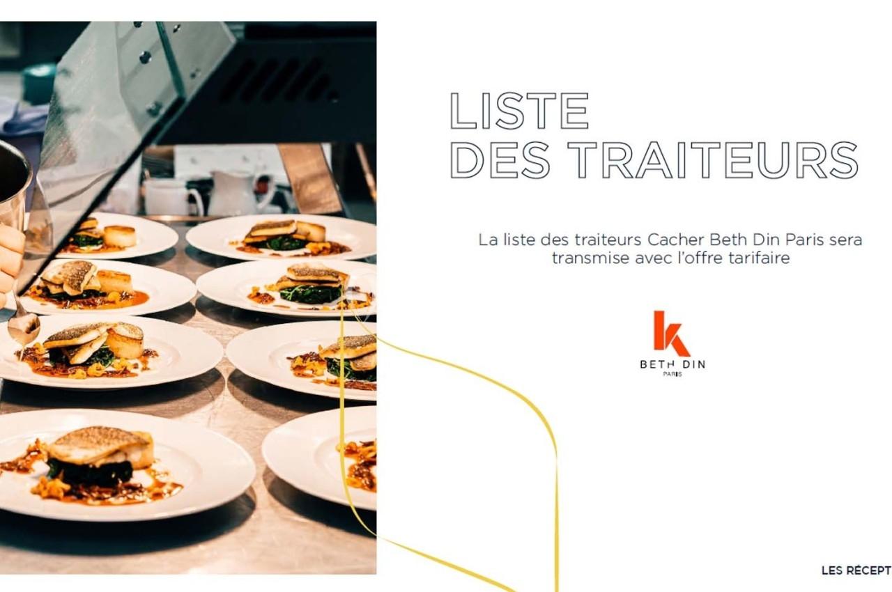 Des assiettes garnies de poisson et légumes sont préparées en cuisine avant d’être servies.