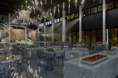 Salle de réception élégante avec tables dressées, éclairage suspendu et grandes baies vitrées donnant sur un paysage arboré.