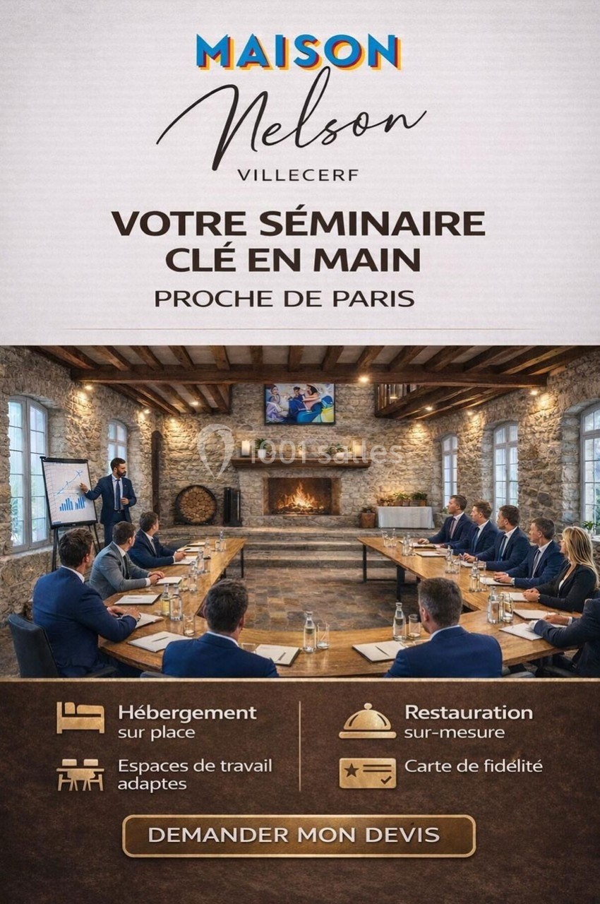 Salle de séminaire en pierre avec table ovale, participants en réunion et présentateur devant un écran.