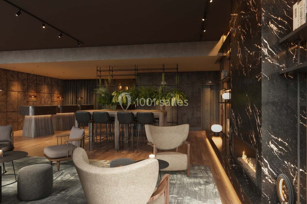 Espace intérieur moderne avec fauteuils, bar, plantes suspendues et cheminée intégrée dans un mur en marbre noir.