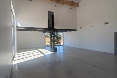 Miniature Location salle Saint-Génis-des-Fontaines (Pyrénées-Orientales) - Mas Puig #12 Vue aérienne d'une maison en pierre avec piscine, jardin, terrasse et espaces verts environnants.