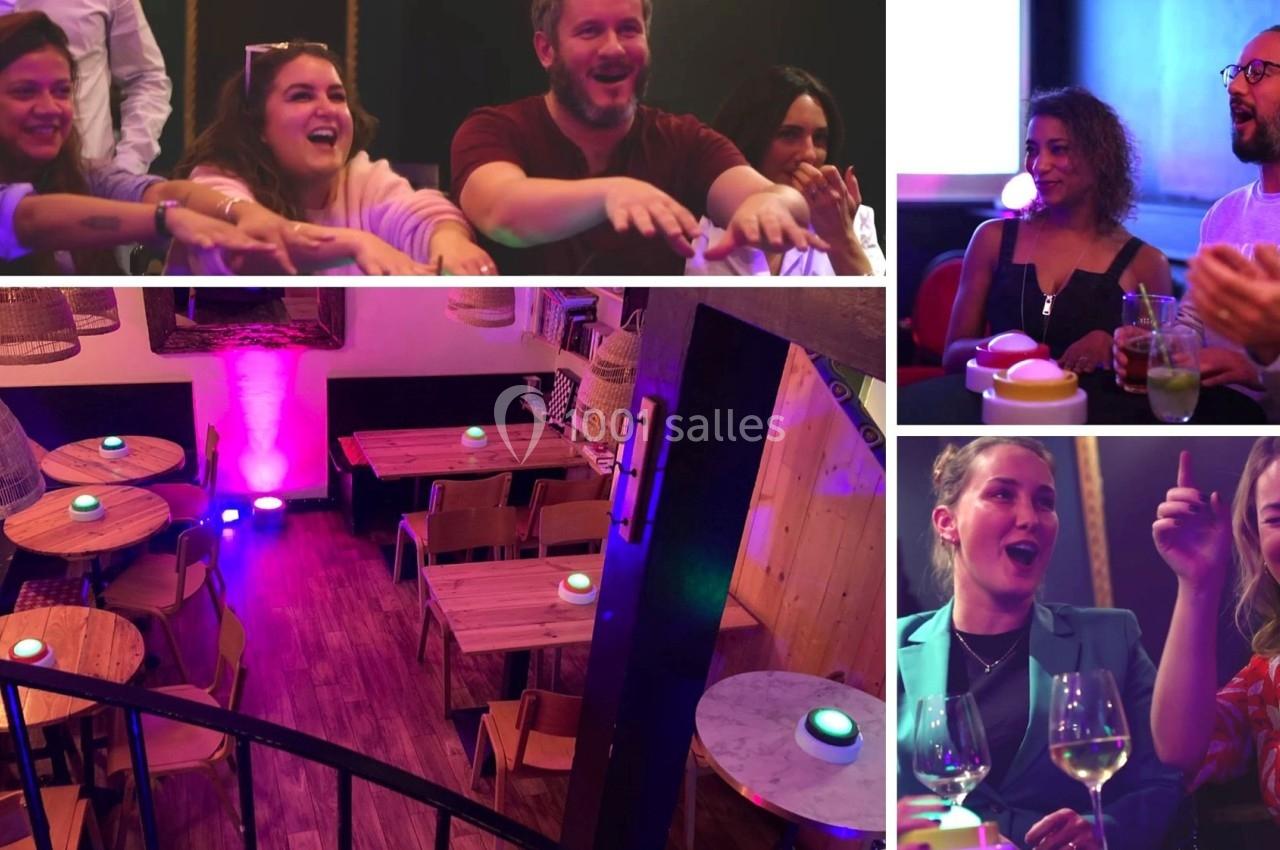 Des personnes rient et participent à une activité conviviale dans un espace chaleureux avec une ambiance lumineuse colorée.