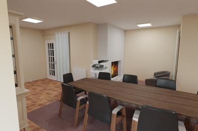 Salle de réunion avec une grande table en bois, chaises noires, cheminée allumée et sol en carrelage.