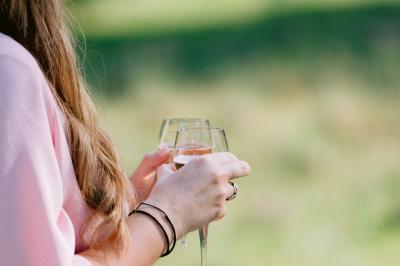 Miniature Location salle Valouse (Drôme) - Hameau de Valouse #22 Salle lumineuse avec tables et chaises en bois, grandes baies vitrées et plafond décoré de motifs végétaux.