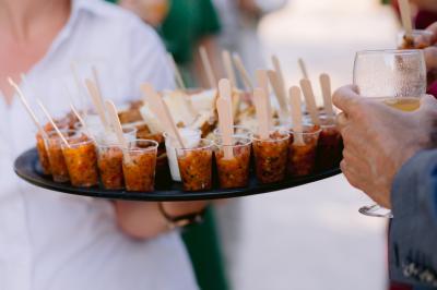 Miniature Location salle Valouse (Drôme) - Hameau de Valouse #41 Salle lumineuse avec tables et chaises en bois, grandes baies vitrées et plafond décoré de motifs végétaux.