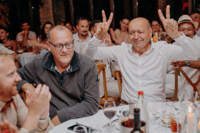 Miniature Location salle Valouse (Drôme) - Hameau de Valouse #47 Salle lumineuse avec tables et chaises en bois, grandes baies vitrées et plafond décoré de motifs végétaux.