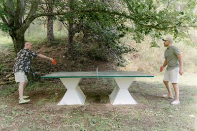 Miniature Location salle Valouse (Drôme) - Hameau de Valouse #51 Salle lumineuse avec tables et chaises en bois, grandes baies vitrées et plafond décoré de motifs végétaux.