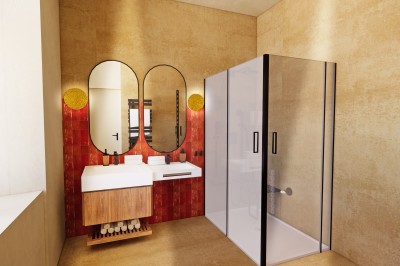 Vue aérienne d'un château en briques rouges entouré de pelouses bien entretenues et d'arbres.