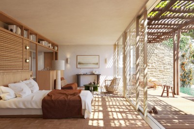 Vue aérienne d'un complexe architectural entouré de végétation, comprenant bâtiments modernes et espaces verts.