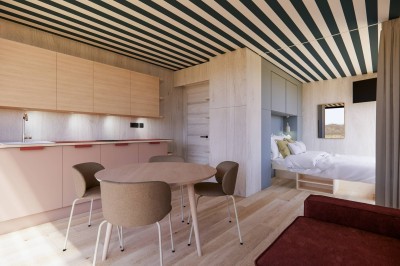 Vue aérienne d'une petite maison avec terrasse en bois, salon, chambre, salle de bain et environnement naturel autour.