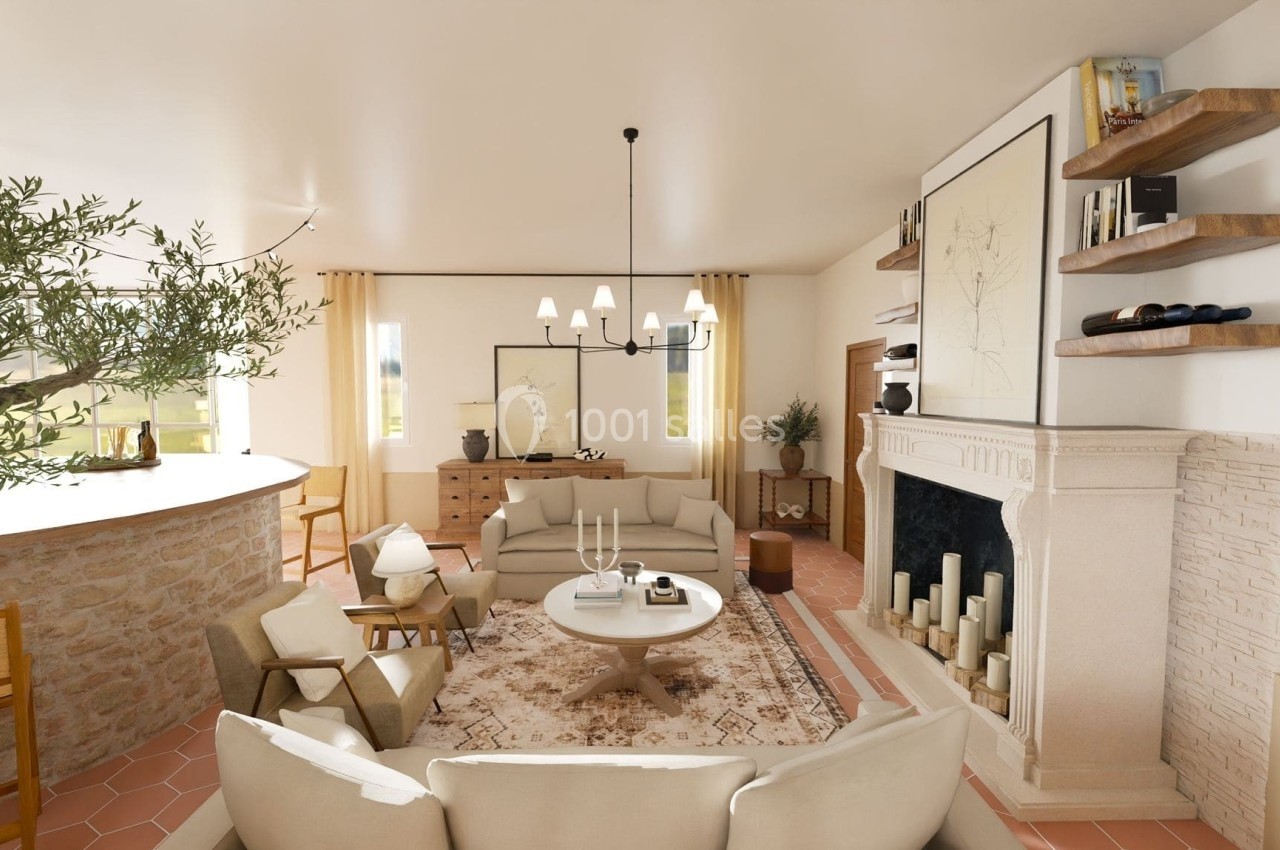 Salon lumineux avec cheminée en pierre, canapé beige, table basse ronde, tapis décoratif et étagères murales.